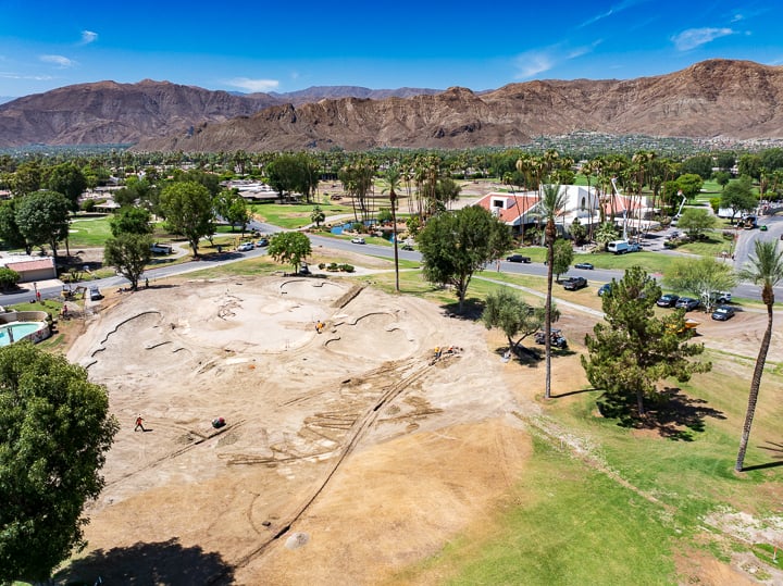 Hole 9 at The Springs Country Club in the shaping phase, with newly formed contours taking shape across the green and surrounding areas.
