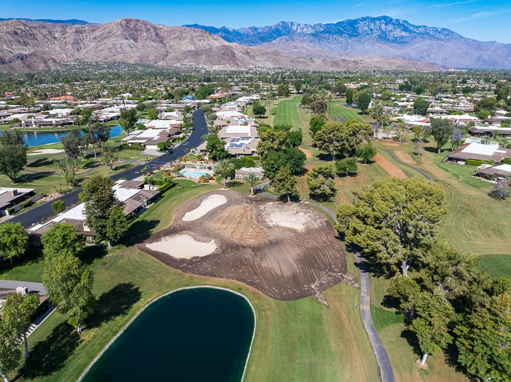 Overhead view of Hole 15 highlighting the green, fairway, and updated course features from above.