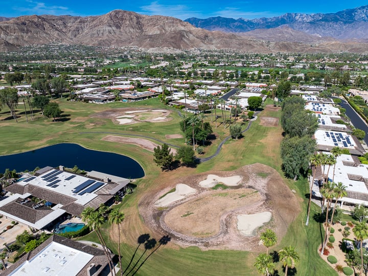 Pre-demolition view of Hole 5 green, showing existing turf and layout before renovation began.